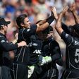 Trent Boult (C) of New Zealand and teammates celebrate the wicket of Australia's Peter Handscomb during their 3rd ODI match, at Seddon Park in Hamilton, on February 5, 2017