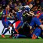 Barcelona players pile onto Sergi Roberto after his winning goal in the Champions League match against Paris Saint-Germain at the Nou Camp stadium on March 8, 2017