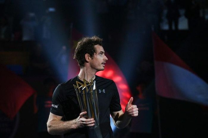 Andy Murray of Britain holds his trophy after winning the Shanghai Masters tennis tournament on October 16, 2016