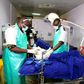 Kenyan Defence force doctors attend to an injured man at Kenyatta National Hospital in Nairobi in December 2016
