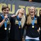 Members of the US Women's football team attend a World Cup championship victory rally in Los Angeles, California in 2015 - they are the first team to win the championship three times