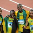 (L-R) Jamaica's Asafa Powell, Nesta Carter, Usain Bolt and Michael Frater celebrating after winning the men's 4×100m Relay final at the National Stadium in Beijing during the 2008 Olympic Games