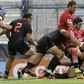 Argentina's Joaquin Tuculet (R) is tackled by South Africa's Warren Whiteley (2-R) and Jacques Nel during their match in Buenos Aires on March 11, 2017