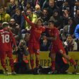 Liverpool's Lucas Leiva (C) celebrates with teammates after scoring the opening goal of their English FA Cup replay football match against Plymouth Argyle on January 18, 2017