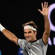 Switzerland's Roger Federer celebrates victory against Germany's Mischa Zverev in the Australian Open quarter-finals in Melbourne on January 24, 2017