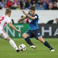 Hoffenheim's forward Sandro Wagner and Hamburg's defender Matthias Ostrzolek (L) fight for the ball during the Bundesliga football match in Sinsheim on November 20, 2016