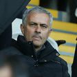 Manchester United's manager Jose Mourinho (C) sits in the stands on November 6, 2016