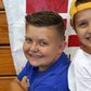 Boy sells his baseball cards to help his friends fight cancer