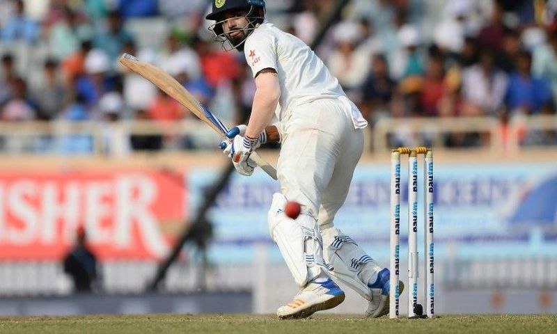 India's Lokesh Rahul watches the ball after playing a shot during a Test match against Australia in Ranchi on March 17, 2017
