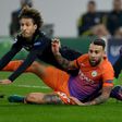 Moenchengladbach's defender Fabian Johnson and Manchester City's defender Nicolas Otamendi fight for the ball
