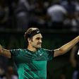 Roger Federer of Switzerland celebrates defeating Nick Kyrgios of Australia in the semi-finals at the Miami Open
