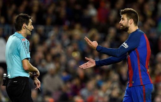Barcelona's defender Gerard Pique (R) Pique is Barca's best defender, leader, possible future president and principal provocateur to the Madrid fans and media