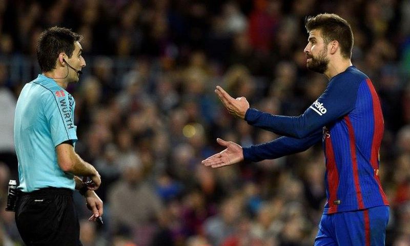Barcelona's defender Gerard Pique (R) Pique is Barca's best defender, leader, possible future president and principal provocateur to the Madrid fans and media