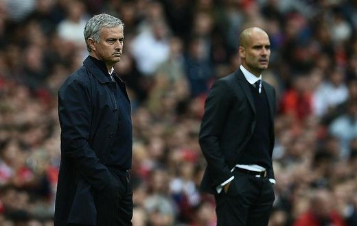 Manchester United's Jose Mourinho (left) and Manchester City's Pep Guardiola during the Premier League match between the two sides at Old Trafford on September 10, 2016