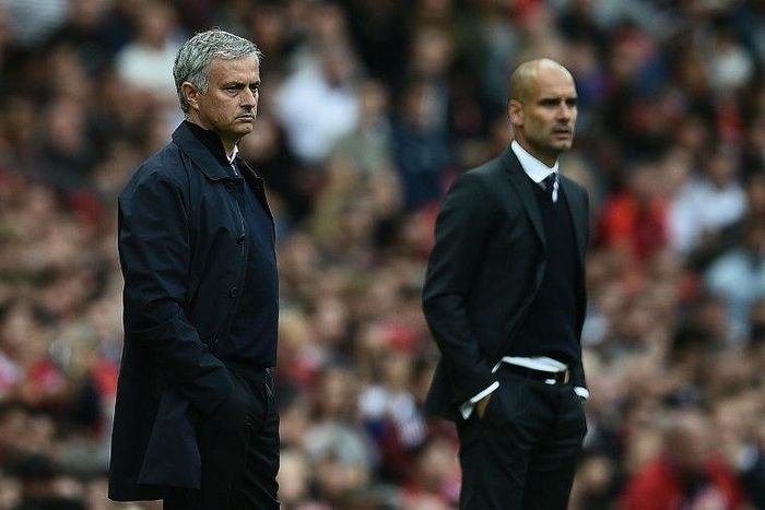 Manchester United's Jose Mourinho (left) and Manchester City's Pep Guardiola during the Premier League match between the two sides at Old Trafford on September 10, 2016