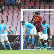 Edin Dzeko (left) scores for Roma against Napoli on October 15, 2016 at the San Paolo stadium in Naples