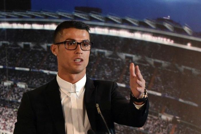 Real Madrid forward Cristiano Ronaldo speaks during the official presentation of his contract renewal at the Santiago Bernabeu stadium in Madrid on November 7, 2016