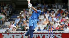 India's Shikhar Dhawan plays a shot on June 11, 2017