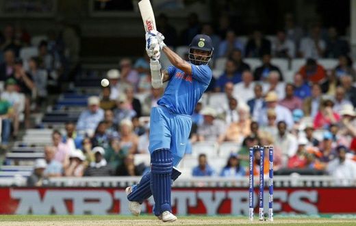India's Shikhar Dhawan plays a shot on June 11, 2017