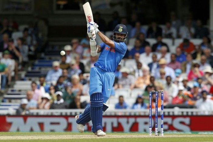 India's Shikhar Dhawan plays a shot on June 11, 2017