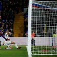 Manchester United's striker Zlatan Ibrahimovic (R) slides the ball into the goal to score their second goal during the English Premier League football match between Crystal Palace and Manchester United on December 14, 2016