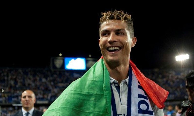Real Madrid forward Cristiano Ronaldo celebrates winning the Spanish league title in Malaga on May 21, 2017