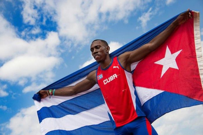 Gold medalist Pedro Pichardo of Cuba celebrates after competing in the Men's Triple Jump finals at the 2015 Pan American Games in Toronto, Canada
