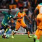 Senegal's forward Sadio Mane (C) vies with Ivory Coast's midfielder Franck Kessie (R) during the friendly football match Ivory Coast vs Senegal, on March 27, 2017, at the Charlety Stadium in Paris