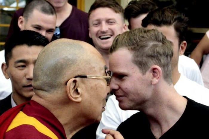 The Dalai Lama (left) greets Australian Test captain Steve Smith in Dharamsala, India, on March 24, 2017