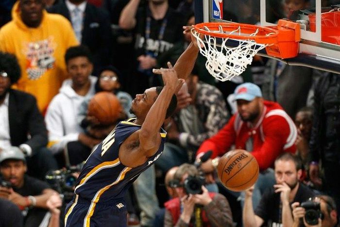 Glenn Robinson of the Indiana Pacers jumped over teammate Paul George, the club's mascot and a Pacer cheerleader to easily win the NBA All Star Game's slam dunk title