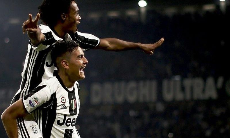 Juventus' forward Paulo Dybala (down) has been tipped for success by rival Diego Perotti