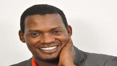 Kwesi Ennin of media Excel in suit