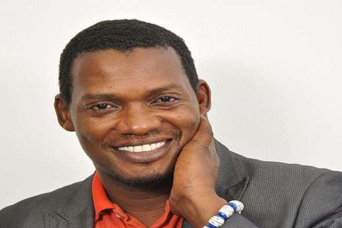 Kwesi Ennin of media Excel in suit