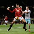Manchester United's striker Zlatan Ibrahimovic (L) shields the ball from West Ham United's defender Aaron Cresswell (R) during the English Premier League football match between Manchester United and West Ham United on November 27, 2016