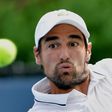 Jeremy Chardy eyes the ball at the USTA Billie Jean King National Tennis Center on August 30, 2013, in New York