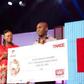 Moses Ugheighele still receives his prize from Rosy Fynn, Marketing Director, Airtel Ghana.