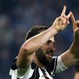 Juventus' forward Gonzalo Higuain from Argentina celebrates after scoring during the Italian Serie A football match Juventus vs Chievo on April 8, 2017 at the Juventus Stadium in Turin