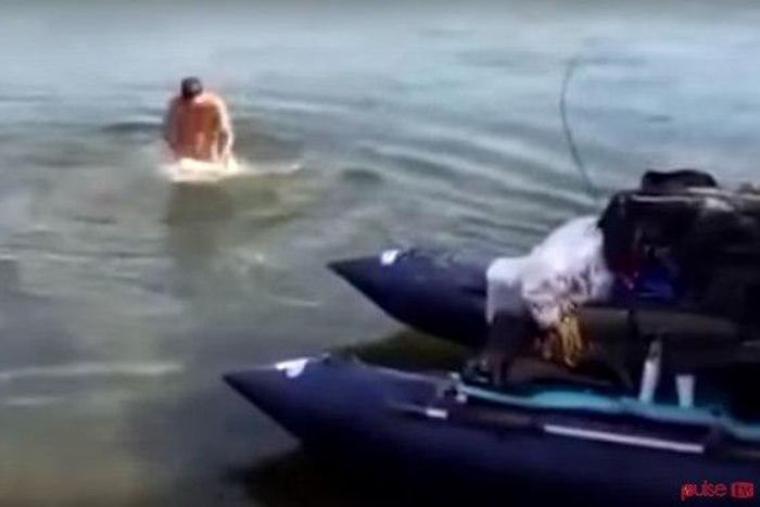 Man goes swimming naked; fish bites his penis