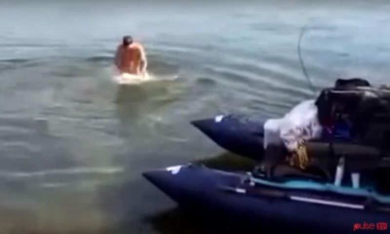 Man goes swimming naked; fish bites his penis