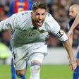 Real Madrid's defender Sergio Ramos celebrates after scoring a goal during the Spanish league football match FC Barcelona vs Real Madrid CF at the Camp Nou stadium in Barcelona on December 3, 2016