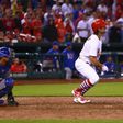 Randal Grichuk of the St. Louis Cardinals hits a walk-off single against the Chicago Cubs in the ninth inning during the 2017 MLB Opening Day, at Busch Stadium in St. Louis, Missouri, on April 2