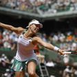 Germany's Angelique Kerber returns the ball to Russia's Ekaterina Makarova during their qualification round match at the Roland Garros 2017 French Open on May 28, 2017 in Paris