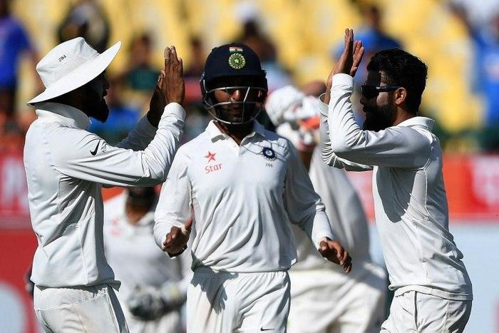 India's Ravindra Jadeja (right) celebrates the wicket of Australia's Pat Cummins on the third day of the fourth Test in Dharamsala on March 27, 2017