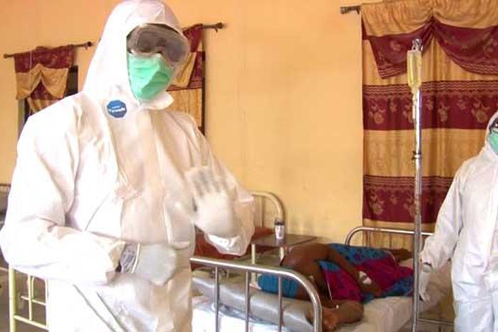 Health workers attending to a Lassa patient