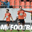 Lorient's forward Jeremie Aliadiere (C) reacts after scoring a goal against Nice on January 8, 2017
