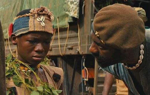 Abraham Attah and Idris Elba in "Beasts of no Nations"