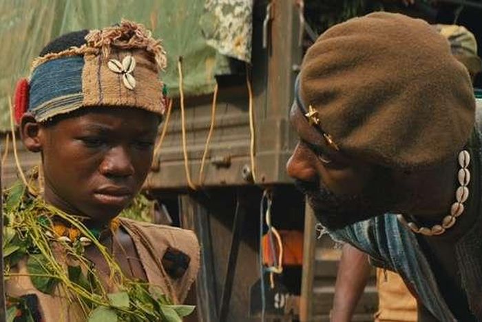 Abraham Attah and Idris Elba in "Beasts of no Nations"