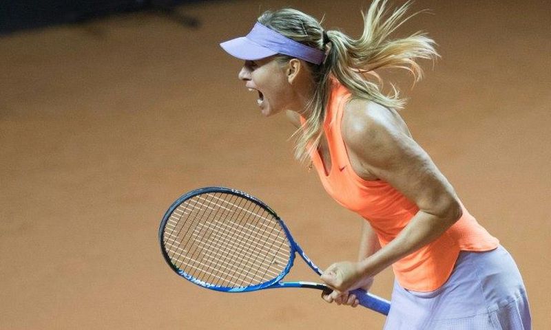 Russia's Maria Sharapova reacts after defeating Italy's Roberta Vinci in their first round match at the WTA tennis Grand Prix in Stuttgart, southwestern Germany, on April 26, 2017