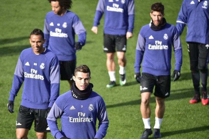 Real Madrid's Brazilian defender Danilo (L), Brazilian defender Marcelo (2L) and Portuguese forward Cristiano Ronaldo (3L) take part in a training session at Valdebebas training ground in Madrid on January 3, 2017