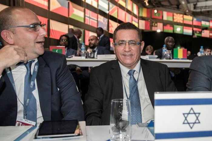 President of the Israeli Football Association Ofer Eini (C) and CEO Rotem Kamer attend the 67th FIFA Congress on May 11, 2017